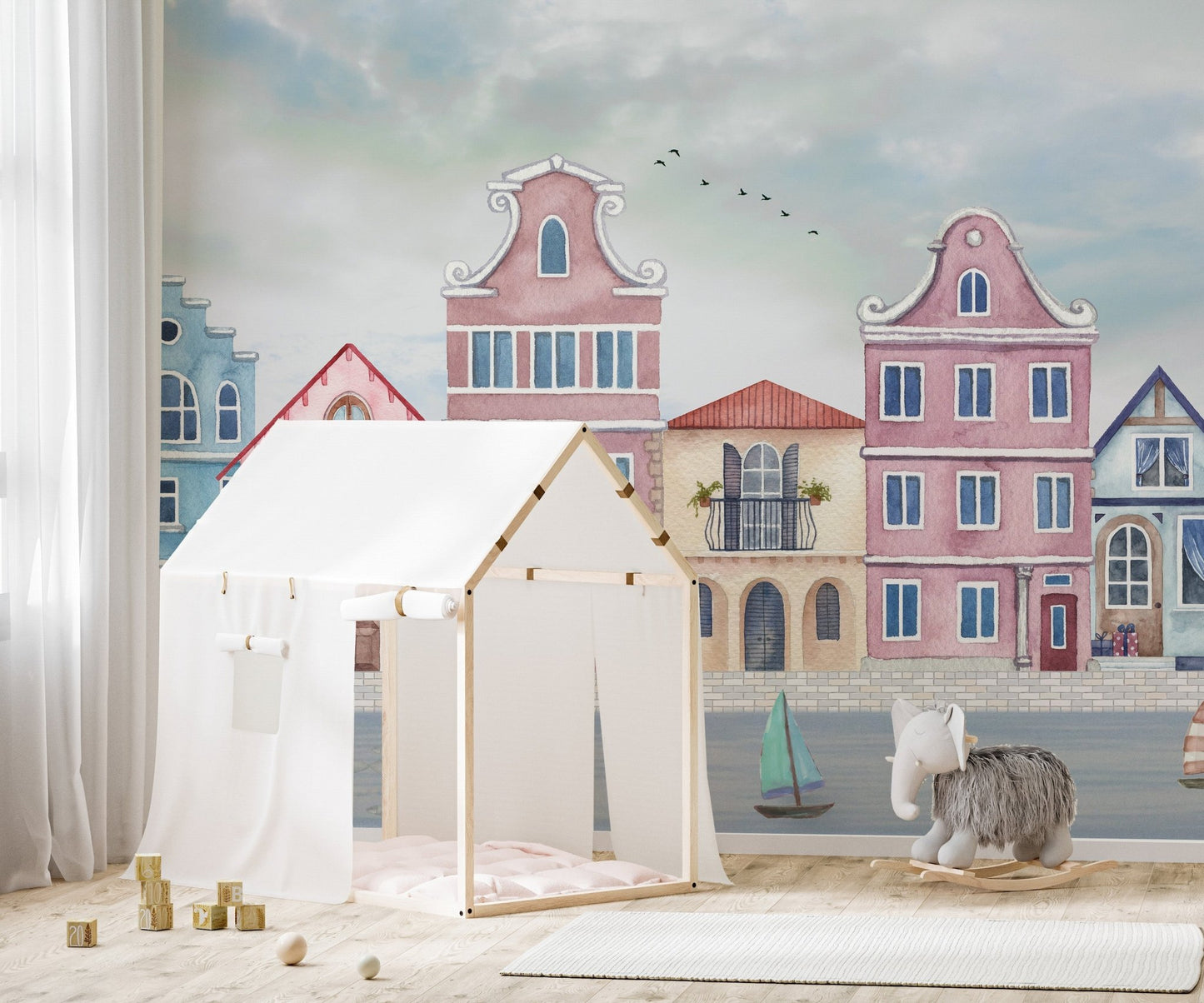 Harbor town wallpaper mural with boats and pastel buildings.