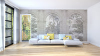 Minimalist living room featuring a grey vintage arched wall mural and white sofa.