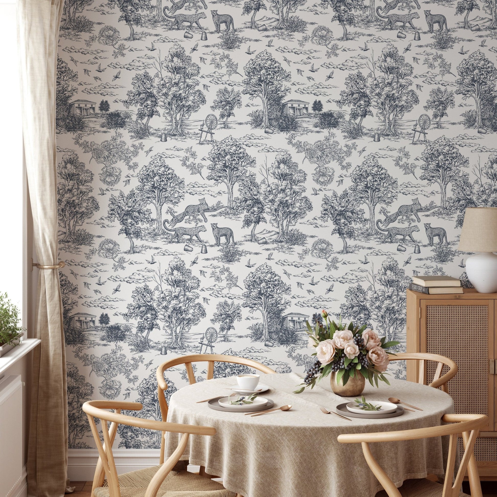 Vintage Trees and Leopard Pattern Wallpaper in a dining room with round table.