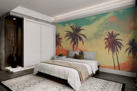 Retro coastal wall mural with orange and teal sunset sky.