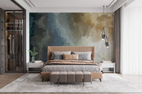 Subtle blue and tan watercolor wallpaper on a bedroom feature wall.