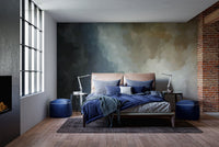 Abstract art wallpaper pattern applied to a large bedroom wall.