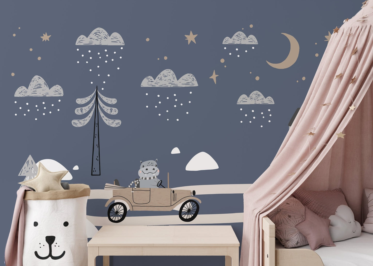 Pink canopy bed against a dark blue car wall mural.