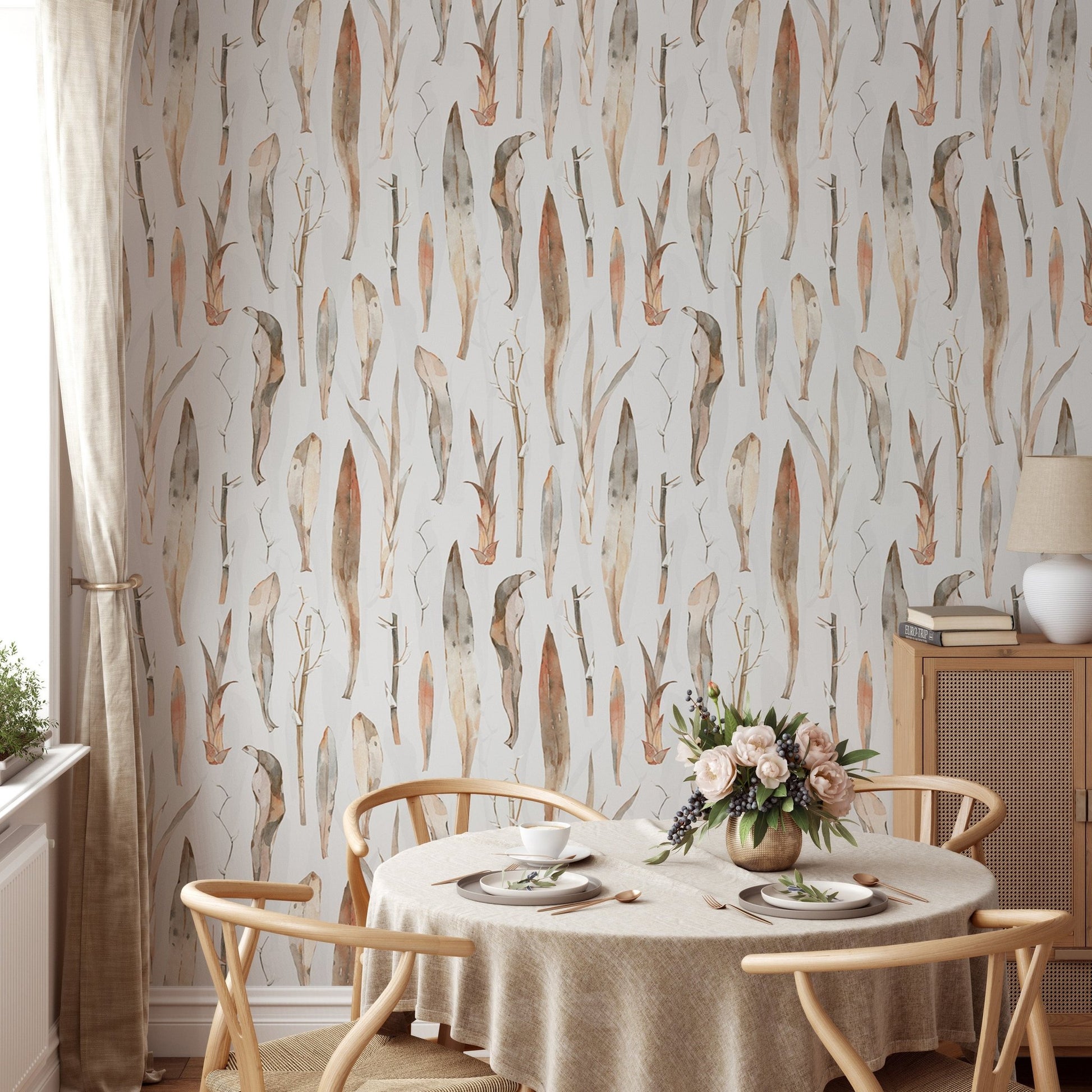 Pastel background wallpaper in a dining room with a round wooden table.