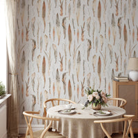 Pastel background wallpaper in a dining room with a round wooden table.