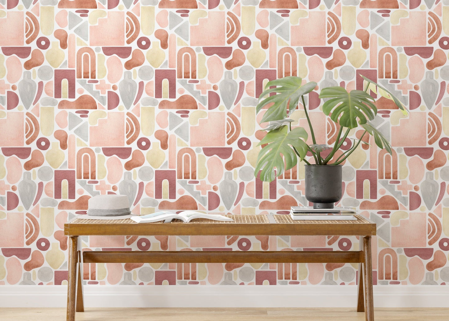 Pastel colored peel and stick wallpaper in a bright hallway with a long wooden bench.