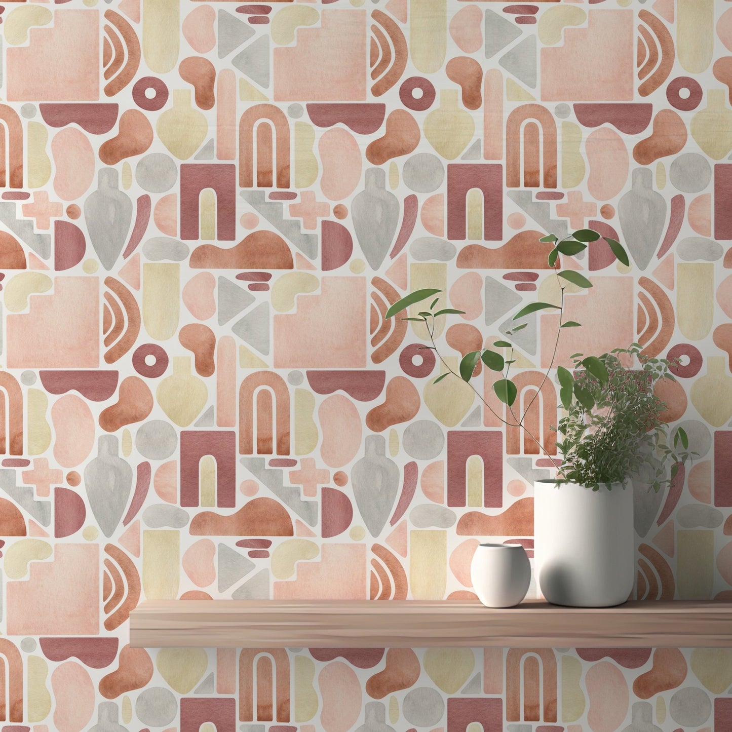 Geometric peel and stick wallpaper applied to a smooth wall in a minimalist interior.