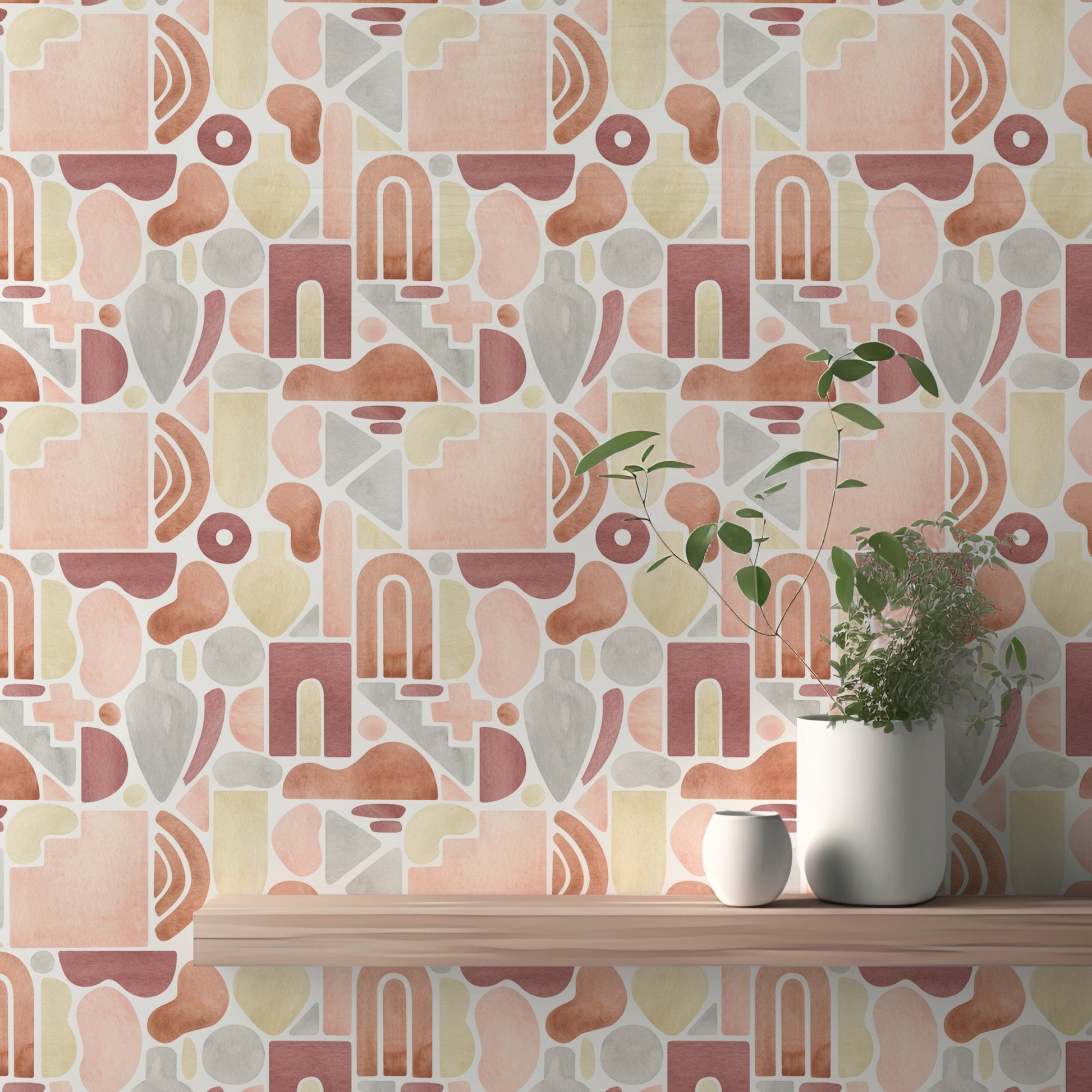 Geometric peel and stick wallpaper applied to a smooth wall in a minimalist interior.