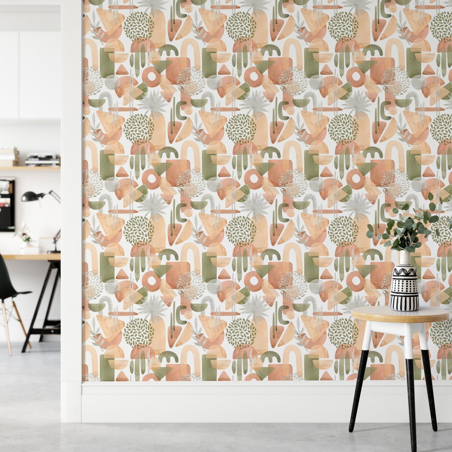 Boho abstract shapes wallpaper in warm green pastel tones in hallway.