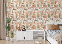 Bedroom featuring a white cabinet and watercolor abstract shapes wallpaper.