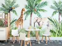 Animal print wall mural for a playroom with small wooden tables and chairs.