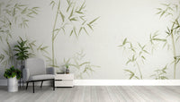 Minimalist botanical wall decor featuring light green bamboo leaves wallpaper.