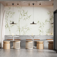 Light green foliage wallpaper design with artistic watercolor bamboo trees.