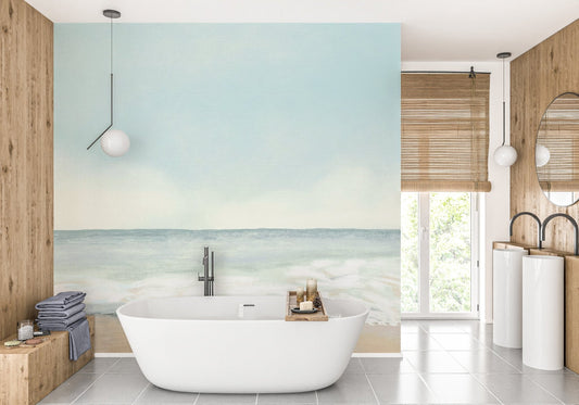 Minimal sea beach wallpaper wall mural in muted aqua and beige color palette.