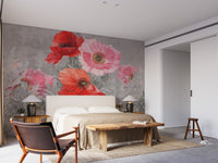 Large red and pink flower watercolor wallpaper mural in a minimalist bedroom.