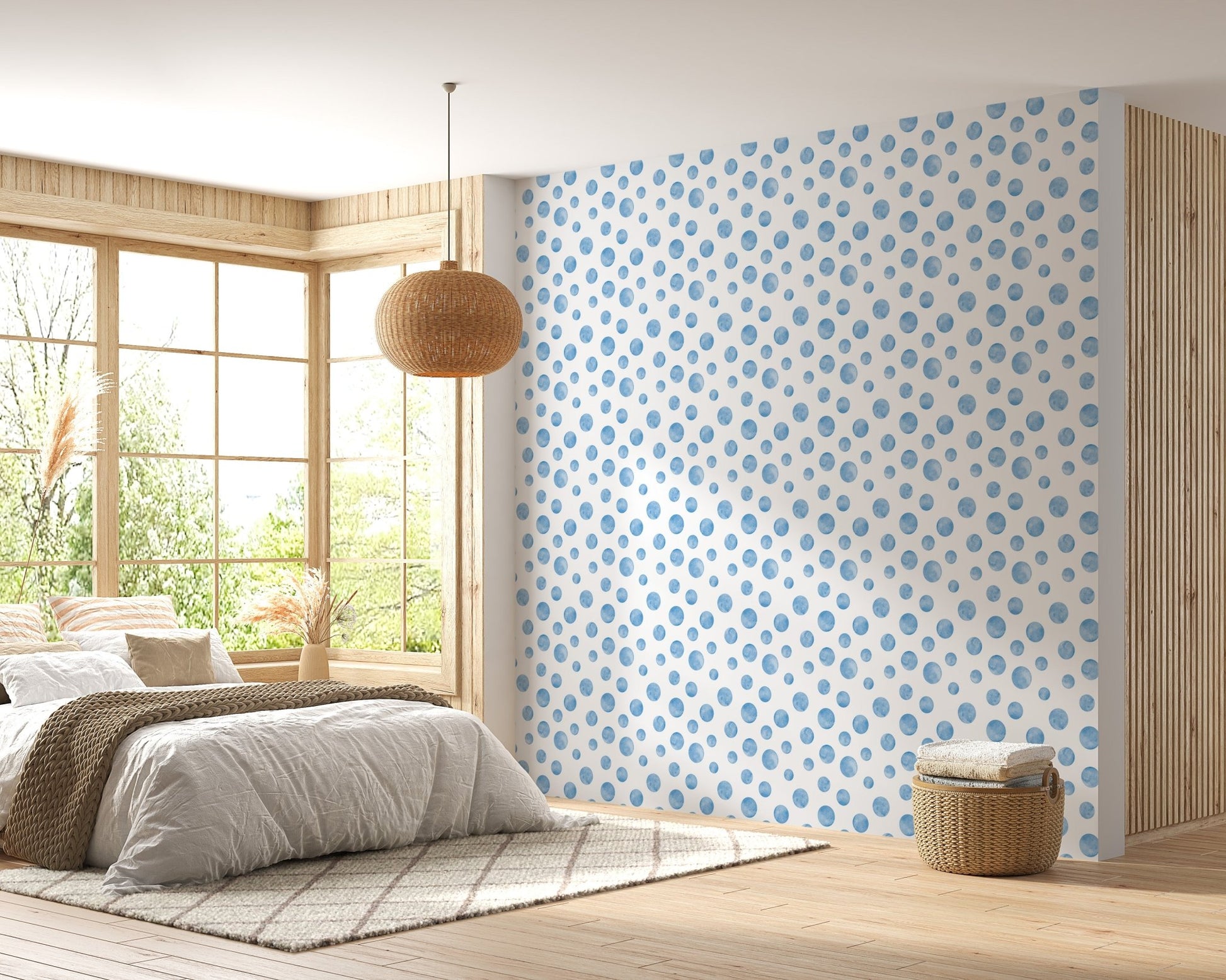 Bright bedroom with a large window and blue seamless design wallpaper.