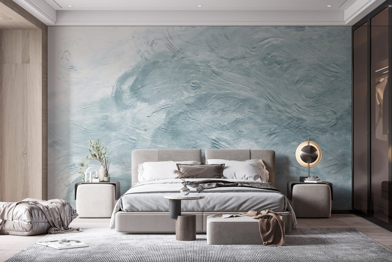 Watercolor Blue Waves Wall Mural in a master bedroom with gray bedding.
