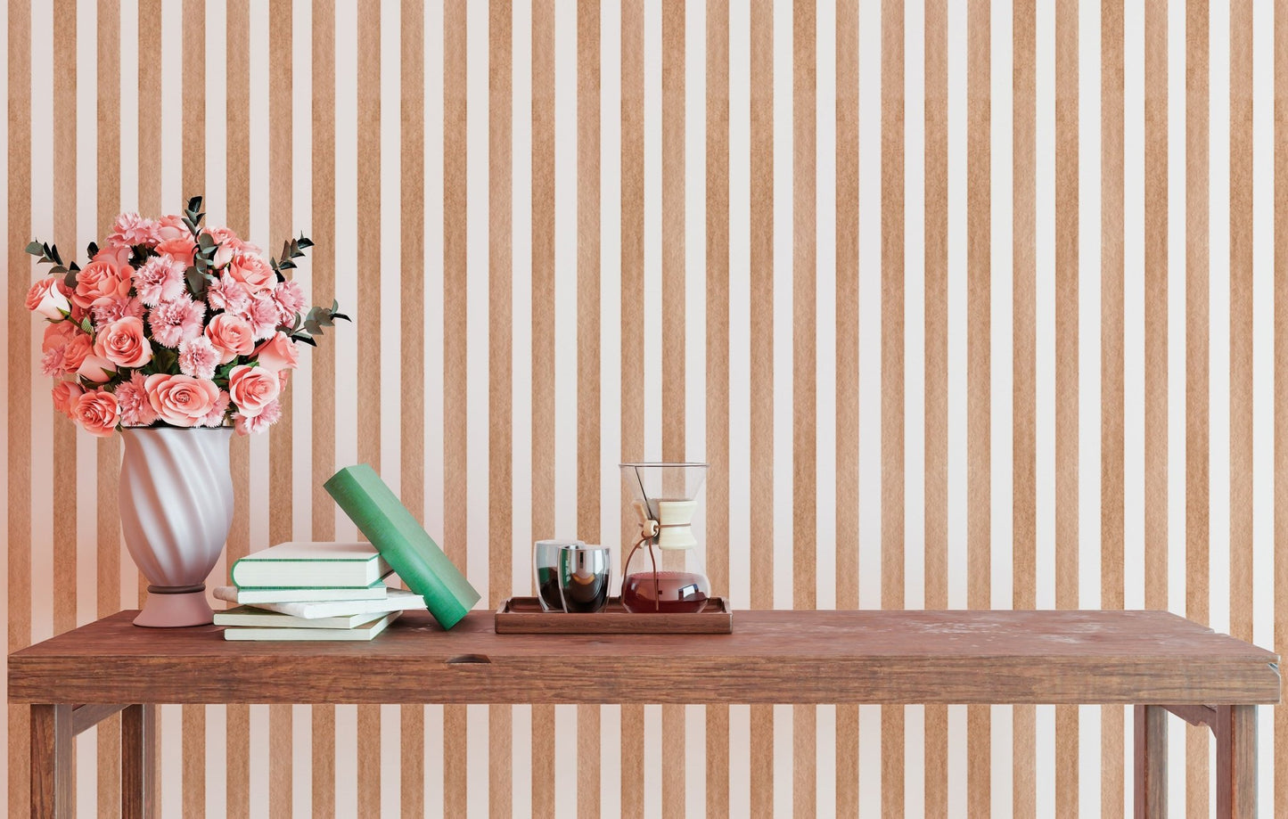 Vintage striped wallpaper behind a table with pink flowers