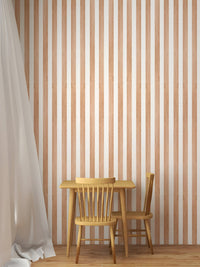 Brown vertical stripes wallpaper behind a wooden dining table
