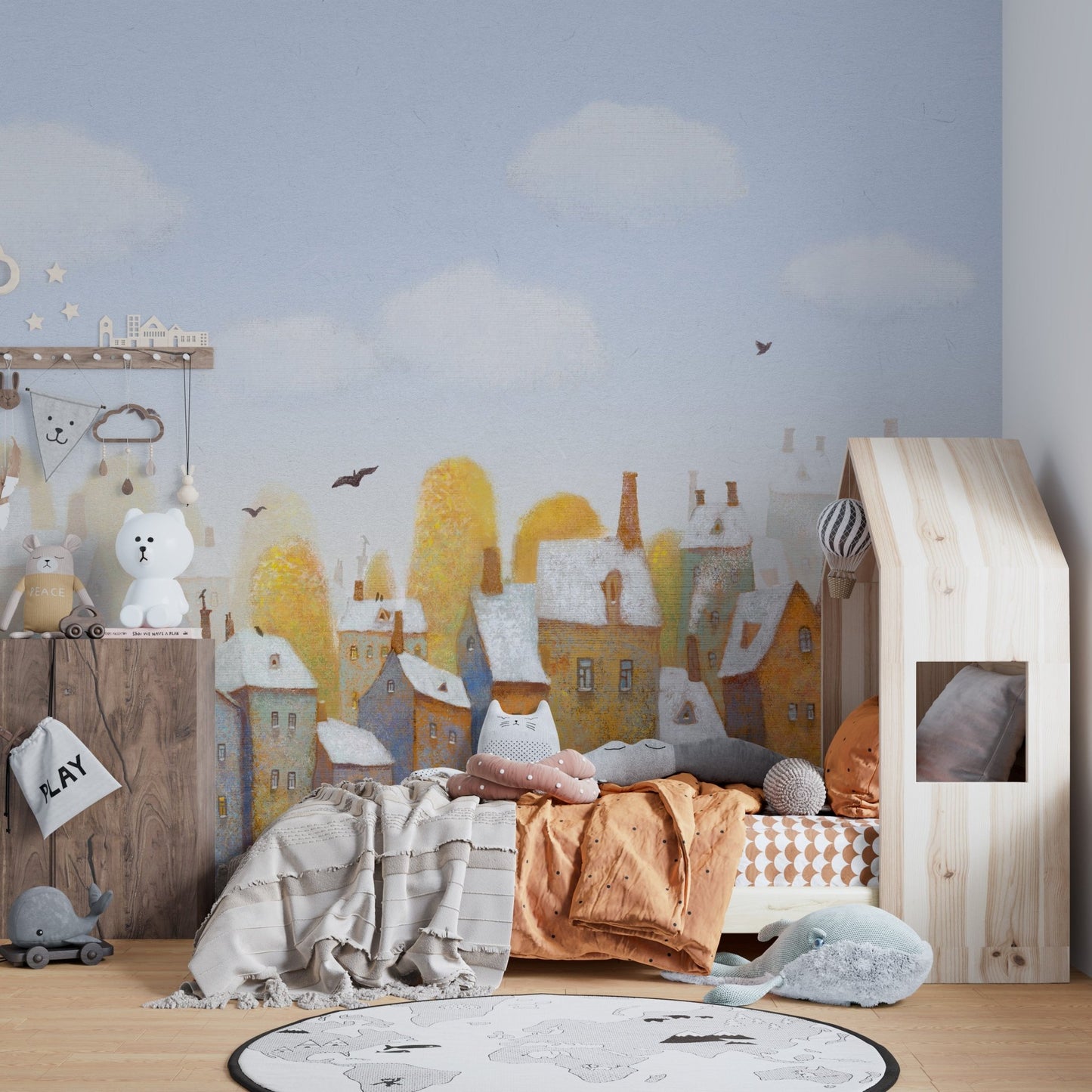 Artistic city town houses wall mural with a light blue sky for children's spaces.