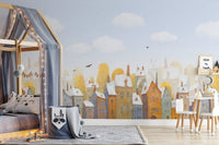 Watercolor City Town Houses mural used as an accent wall in a kids bedroom.