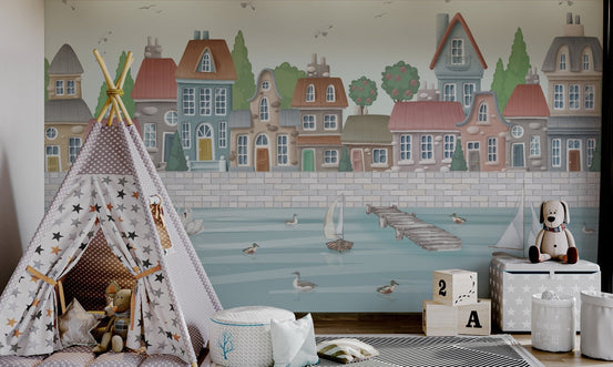 Waterfront cityscape wall mural with rowboats and swans on blue water.