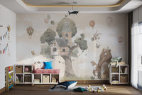 Large tree house and hot air balloon wall mural in a play zone.