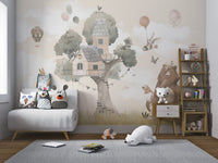 Neutral tone watercolor animal wall mural in a child's playroom.