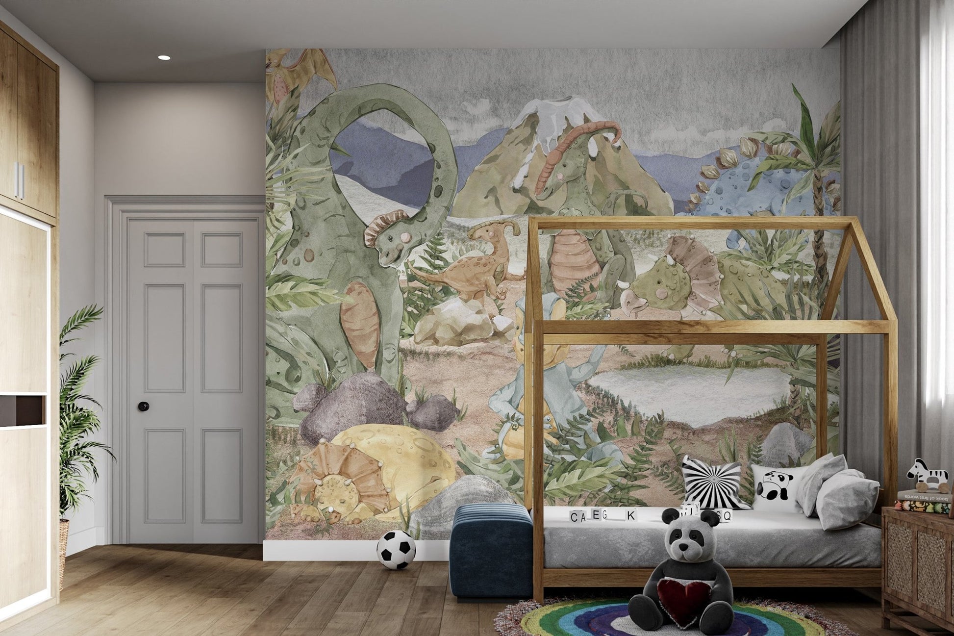 Soft pastel dinosaur mural with plants, rocks, and mountains in kids bedroom.
