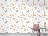 Animal pattern wallpaper behind a pink chair in kids room.