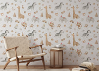 Neutral tone safari animal wallpaper in a bright reading with a woven chair.