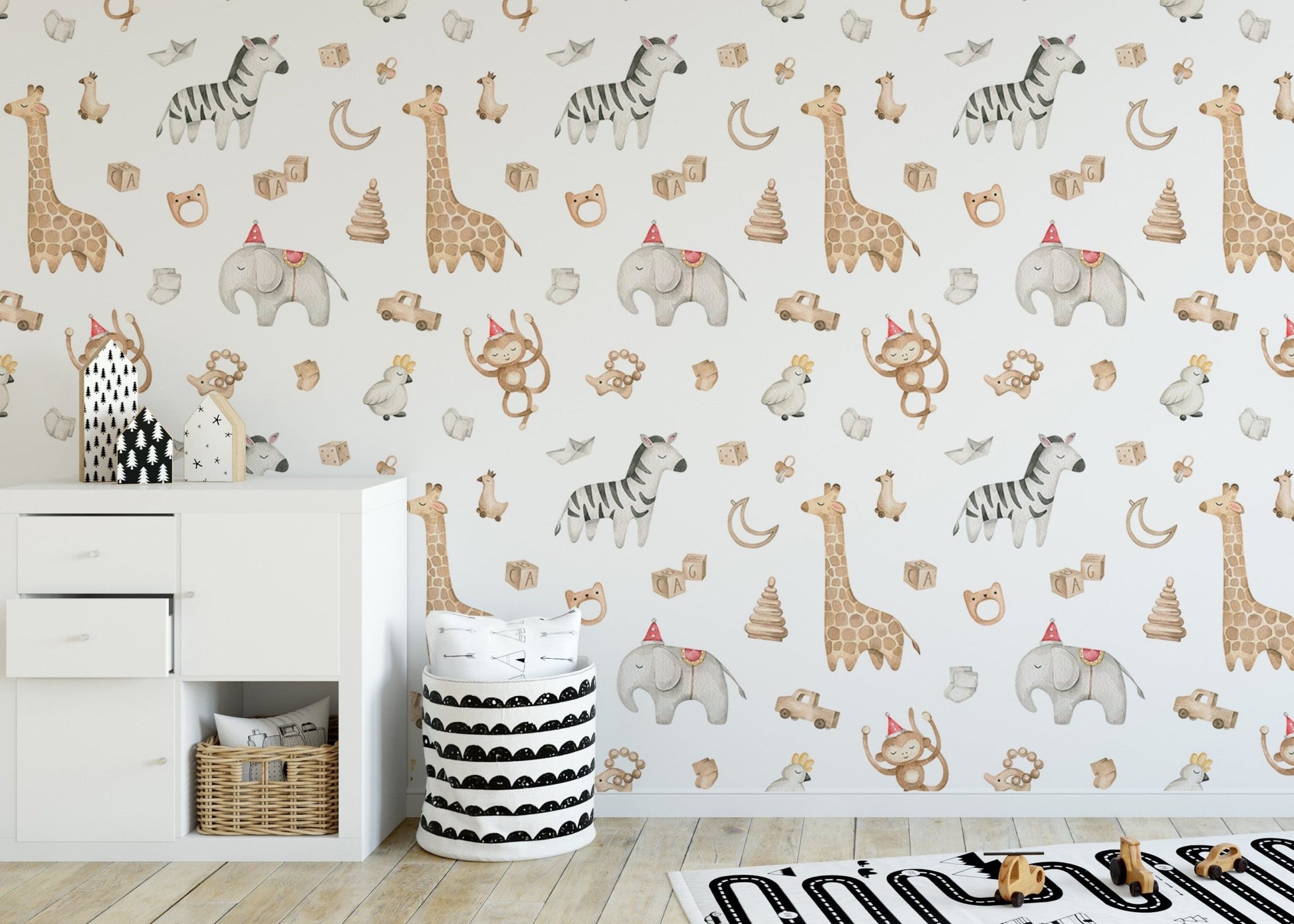 Safari animal wallpaper with zebra, giraffe, and elephant motifs in kids room.