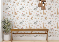 Animal pattern wallpaper with giraffes and elephants in a minimalist hallway.