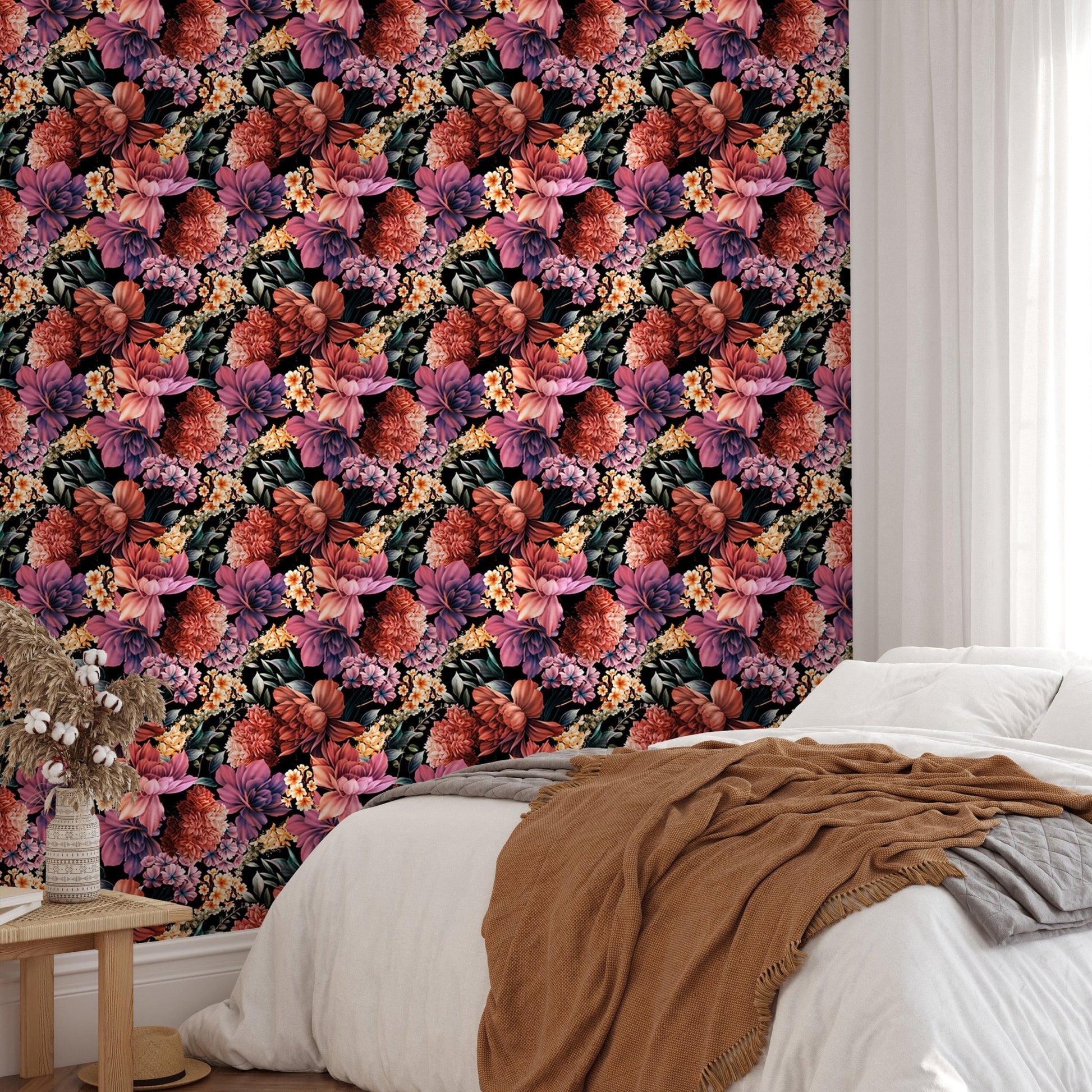 Summer flower wallpaper in a bedroom setting with a tan blanket and white bed.