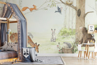 Watercolor wall mural showcasing animal friends in toddler bedroom.
