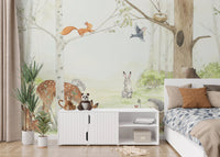 Gentle forest animal wall mural in bright kids bedroom.