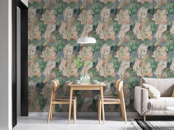 Apartment dining area with wooden furniture and watercolor leaf wallpaper.