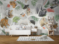 Nature-inspired gray wall mural with monkeys and birds in kids play area.