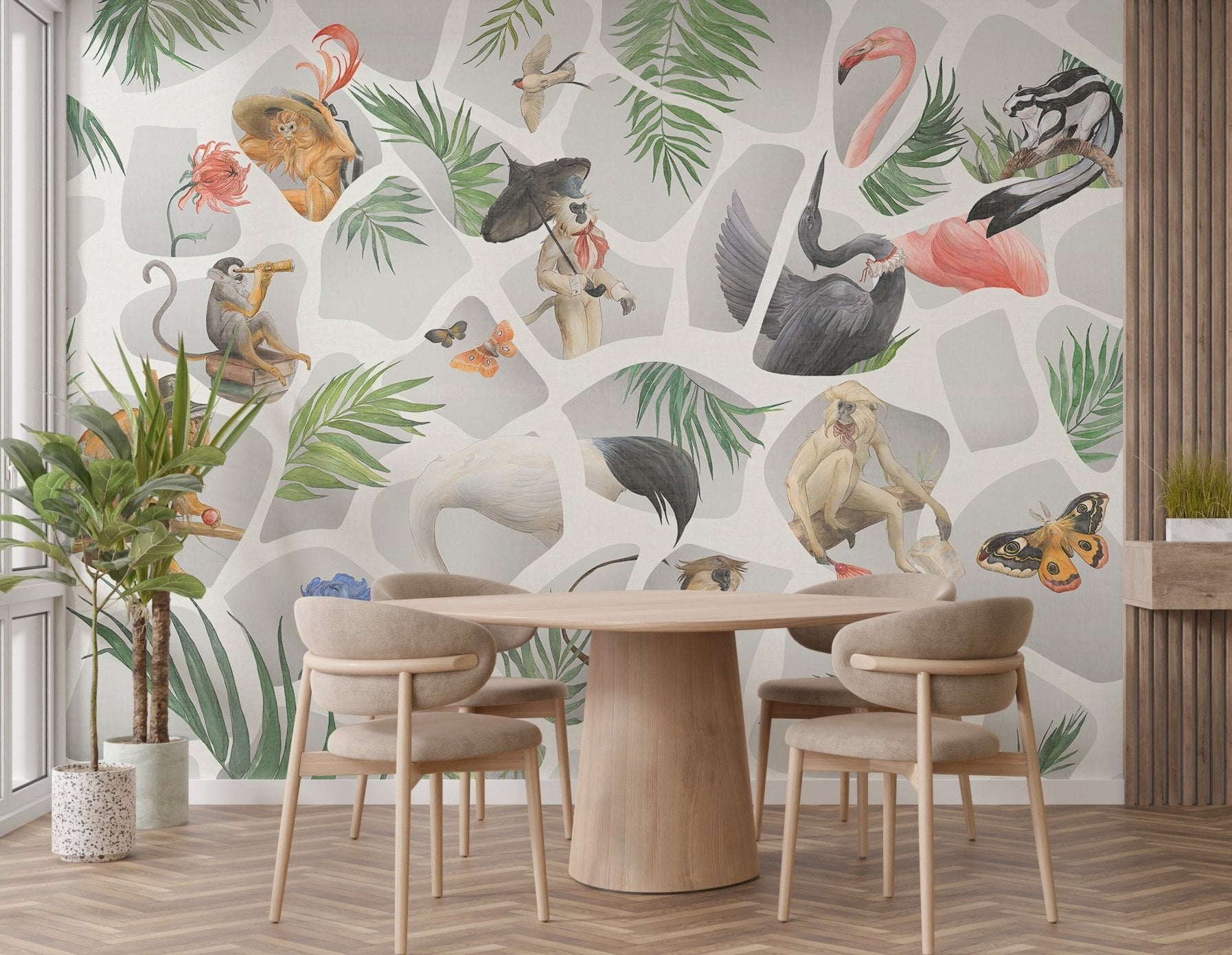 Wall mural featuring monkeys and tropical leaves behind a dining table.