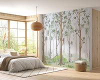 Sunlit bedroom featuring a light wood floor and a green forest wall mural.