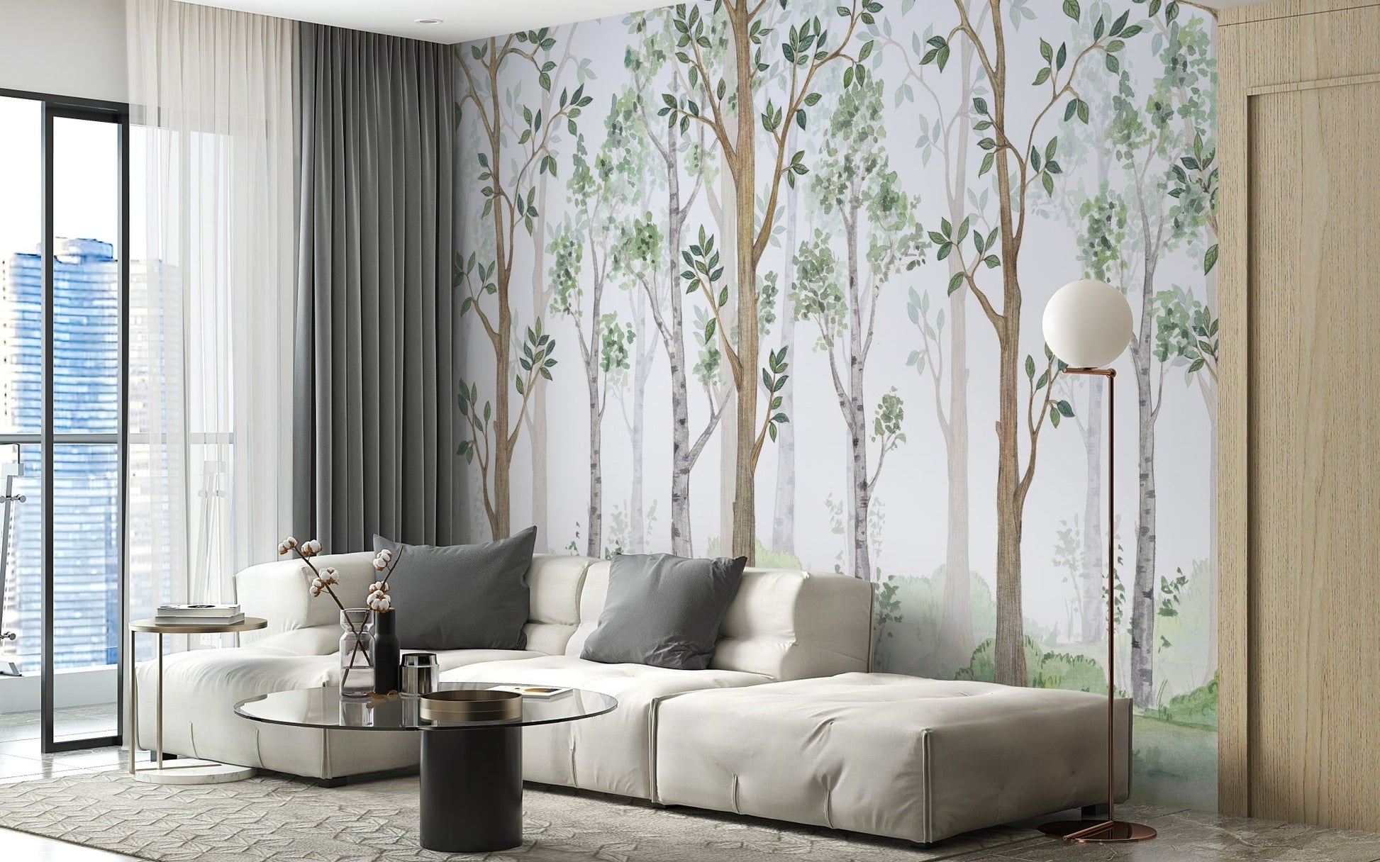 Modern living room with a white sofa and a watercolor tree wall mural.