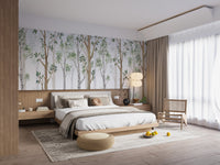 Bright apartment bedroom with a watercolor tree wall mural and curtains.