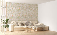 Green leaf meadow flower wallpaper in a modern living room with a white sofa.