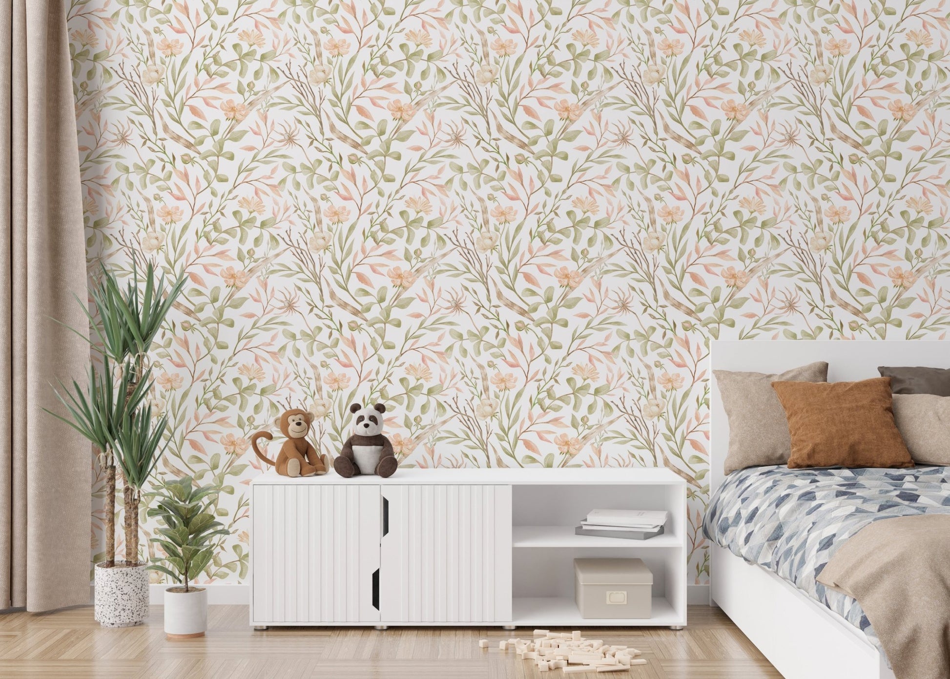 Floral leaf wallpaper in a bedroom with white storage cabinets and wooden flooring.