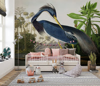 Heron themed wall mural in a kids room featuring a pink bed and grey carpet.