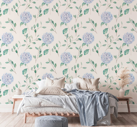 Bedroom with Watercolor Hortensia Flowers and Branches Wallpaper and wooden bed frame.