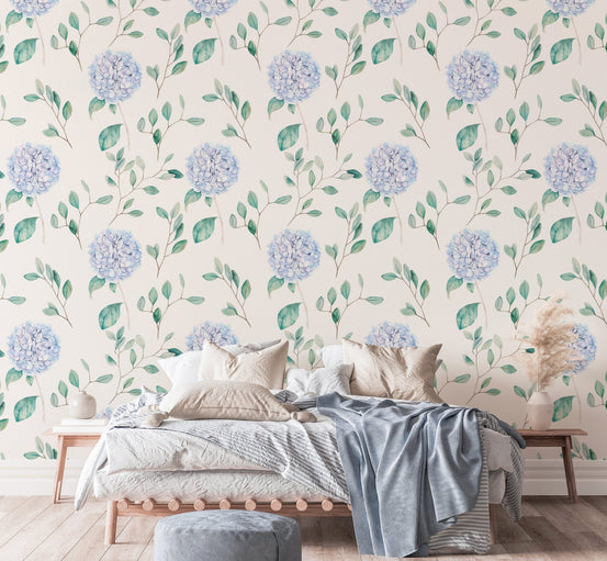 Bedroom with Watercolor Hortensia Flowers and Branches Wallpaper and wooden bed frame.