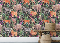 Detailed safari animals floral wallpaper with a wooden side table and rug.