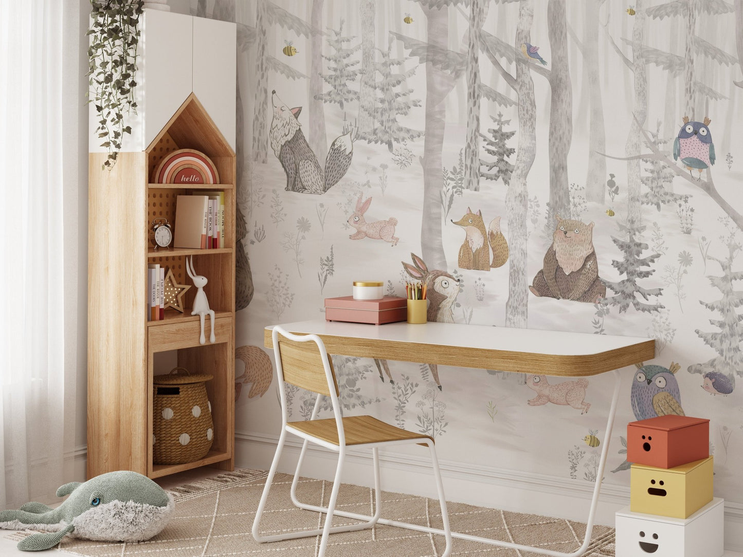 Study space for kids with a light grey watercolor tree wall mural.