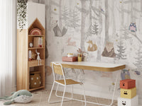 Study space for kids with a light grey watercolor tree wall mural.